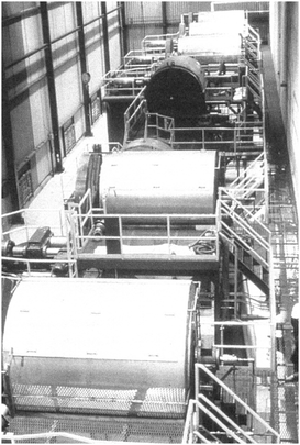 Commercial production-size ball mills used for mechanical alloys. Reprinted with permission from ref. 14. Copyright 2001, Elsevier.